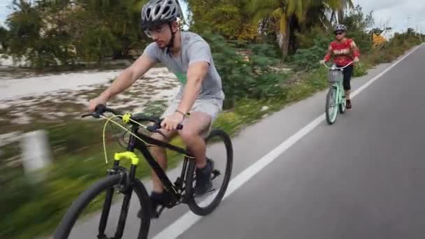 Teen Son Mature Mother Riding Bicycles Road Tropical Vacation — Stockvideo