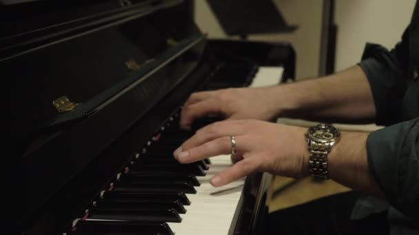 Married Man Playing Piano Slow Motion Camera Slide Movement — Stock Video