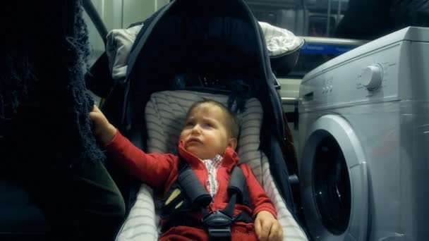 Unhappy Toddler Stroller Trying Get Attention Her Mother Travelling Train — Vídeo de Stock