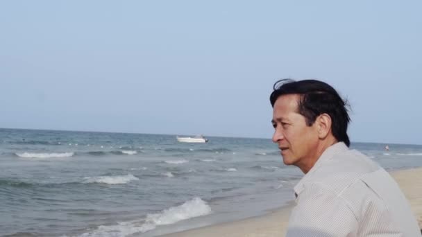 Vietnamese Man Sitting Alone Beach Deep Thought — Wideo stockowe