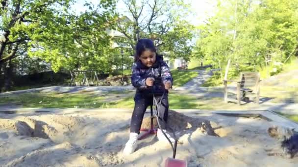 Child Playing Digging Excavator Sandbox Real Time Footage 60Fps — Stockvideo