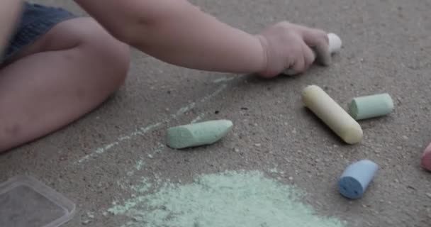 Cute Little Blonde Boy Drawing Playing Chalk Sidewalk — Stockvideo