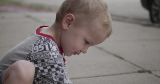 Cute Little Blonde Boy Drawing Playing Chalk Sidewalk — Stock Video