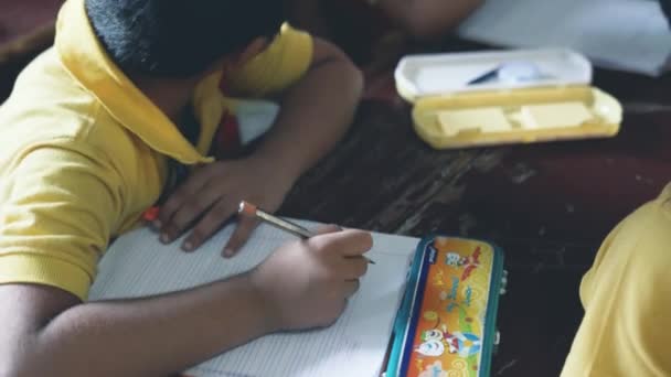 Indian Elementary School Boys Practice Writing Talking Each Other Looking — Vídeo de Stock