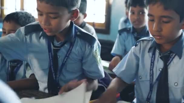 Young Indian School Boys Blue Uniforms Starting Make Paper Airplanes — Video Stock