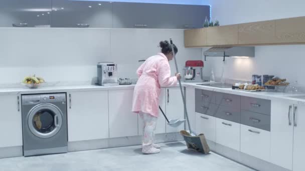 Lady Cleaning Her Modern Apartment Kitchen Sweeping Mopping Floor — Stock video