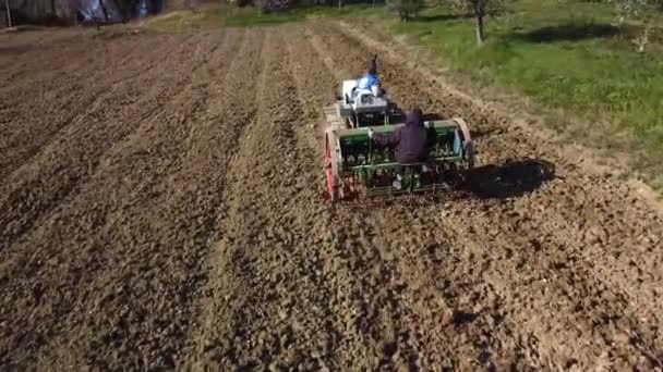 Farmer Tractor Seeder Working Land Sunset Aerial Shot — Stock Video