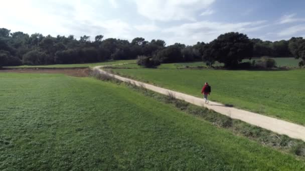 Young Man Walking Alone Country Gravel Road Somewhere Unknown Location — Vídeo de Stock