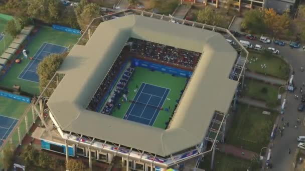 Slow Orbiting Aerial View Live Tennis Match Playing Out Stadium — Stock Video
