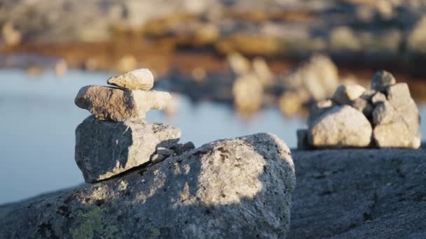 Close Shot Small Stone Cairns Top Big Boulder Small Pond — Video
