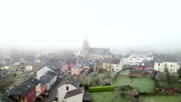 Aerial View Historic Church Small Town Luxembourg Foggy Day — Vídeos de Stock