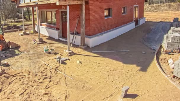 Workers Installing Gray Bricks Patio Summer Day High Speed Shot — Video