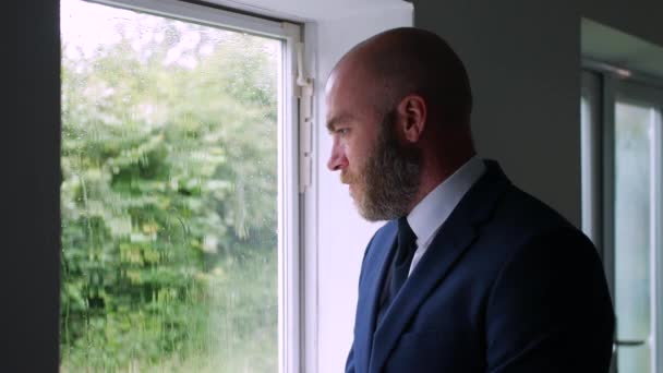 Sad Pensive Lonely Businessman Looking Grey Sky Rain His Office — Videoclip de stoc