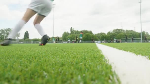 Team Girls Playing Soccer Pitch Match Low Angle — Stockvideo