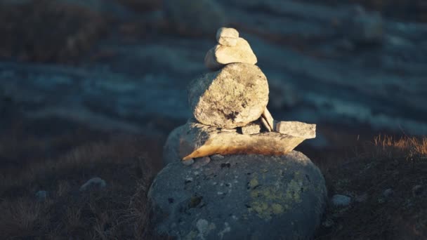 First Rays Rising Sun Light Stone Cairn Slow Motion Pan — Wideo stockowe