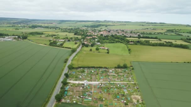 Aerial Rural English Countryside Allotments Fields Village Background — Stockvideo