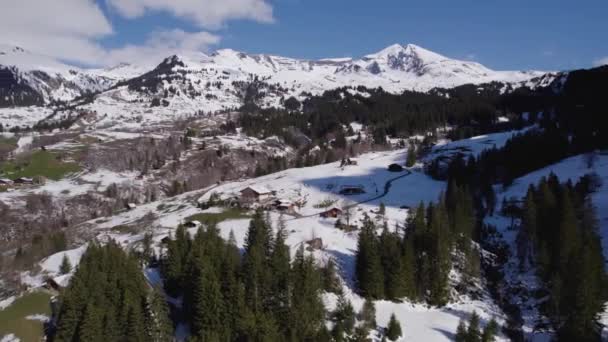 Aerial Drone Footage Late Snow Fall Spring Dreamy Mountain Village — Stock Video