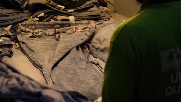 Worker Checking Stack Denim Jeans Light Factory Pakistan — Video