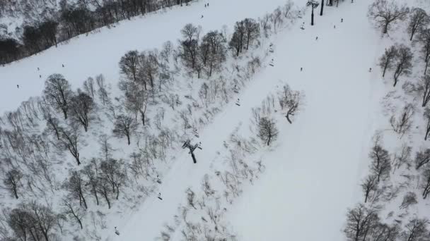 Chair Lift Taking Skiers Snow Mountain Winter Ski Resort Nozawa — Stockvideo