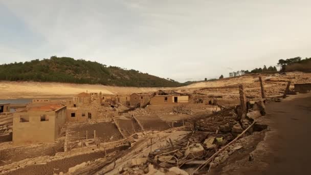 Abandoned Ghost Town Lake Water Emerging Pan Left View — Vídeos de Stock