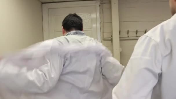 Scientists Hanging Lab Coats Finishing Work Laboratory — Stock video