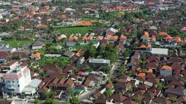 Wide Aerial Dense Populated Residential Area Bali Indonesia Orange Roofs — стоковое видео