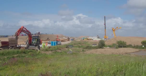 Construction New Road Being Developed Cornwall Excavators Scooping Soil — Vídeo de Stock