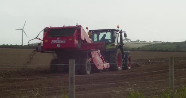 Farmer Pulling Heavy Machinery Using Separating Technology Cultivating Soil Tractor — Stockvideo