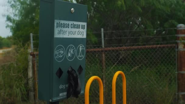 Please Clean Your Dog Sign Pet Poop Bags — Video Stock