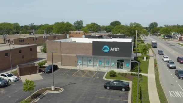 Low Aerial Establishing Shot Att Communications Store — Vídeo de Stock