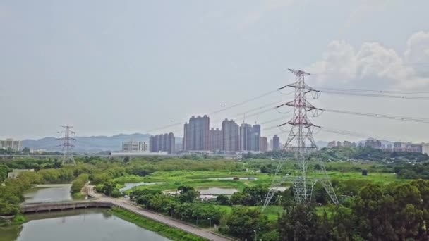 Dynamic Aerial Shot High Voltage Electric Towers Town Yuen Long — ストック動画