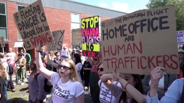 Protestors Hold Various Handmade Cardboard Placards Chant Protest First Flight — Stockvideo