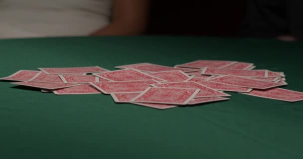 Group Gamblers Draw Cards Pile Dark Moody Casino — Stockvideo