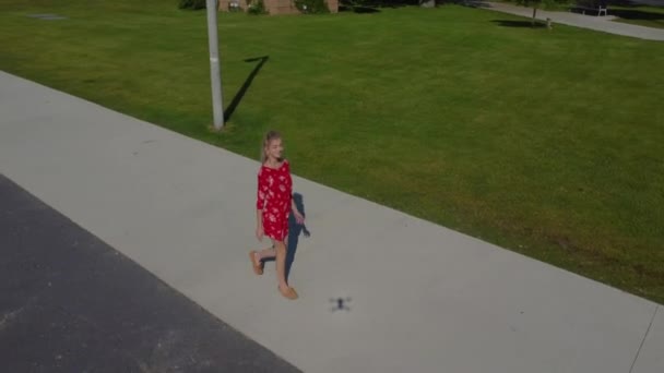 Tracking Shot Young Women Walking Waterfront Wearing Cute Red Dress — Vídeo de stock
