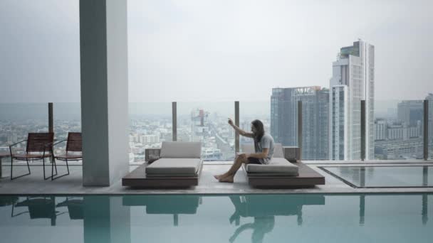 Freelancer Swiping His Touch Screen Laptop While Sitting Placid Pool — 图库视频影像