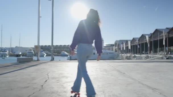 Girl Roller Skates Boats Harbor Sunlight Slomo — Stockvideo