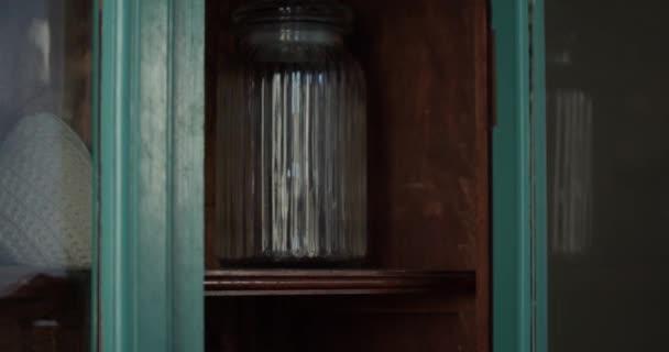 Woman Hands Placing Vintage Film Camera Storage Cabinet Slow Motion — Vídeos de Stock