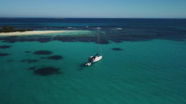 Small Sailboat Anchored Cove Small Island New Caledonia Aerial Parallax — Vídeos de Stock