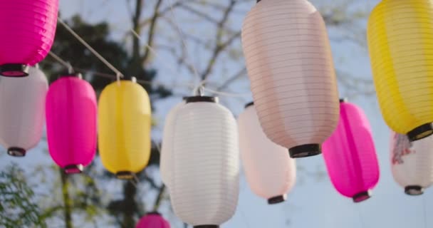 Beautiful Multicolored Lanterns Hanging Outdoor Sunlight Close Slow Motion — Stok video