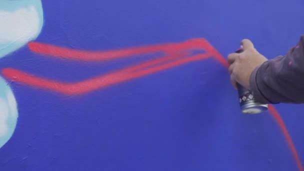 Artist Graffiti Paint His Hands Draws Colorful Wall Red Line — Vídeos de Stock