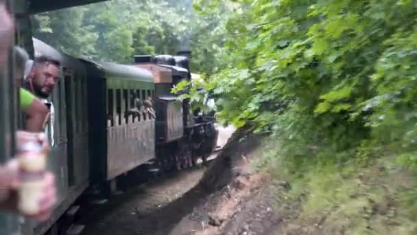 Passengers Peering Out Waving Out Windows Moving Steam Train — Stock Video