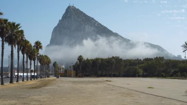 Smoke Clouds Circling Rock Gibraltar Mountain Promontory — Vídeos de Stock