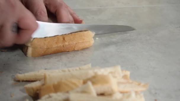 Cook Cuts Crusts Slices White Bread Serrated Knife — Vídeos de Stock