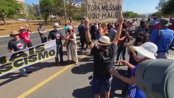 Man Message Fight Evil Messiah Sign Holding His Head Protest — Stock Video