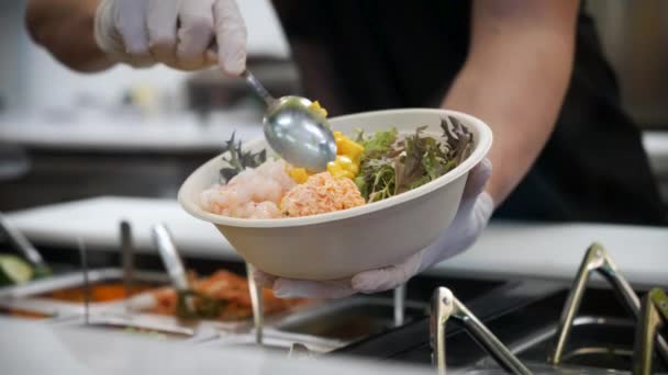 Worker Scoops Adds Chopped Mango Poke Bowl Salad Slow Motion — Vídeos de Stock