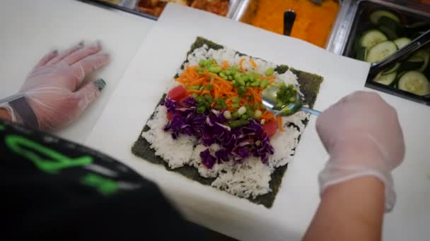 Overhead Shot Worker Sprinkling Green Onions Poke Burrito Worker Assembles — Wideo stockowe