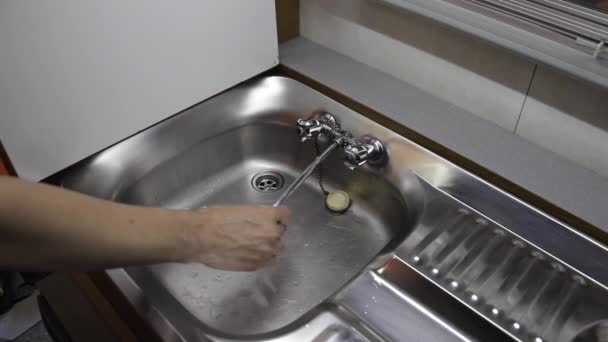 Woman Putting Away Water Faucet Closing Lid Kitchen Old Motorhome — Video Stock