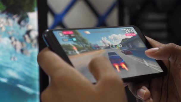 Young Man Playing Racing Game His Phone Dynamic Screen Action — Vídeo de Stock