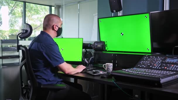 Caucasian Man Working Video Edit Suite Multiple Screens Chroma Key — Stock Video