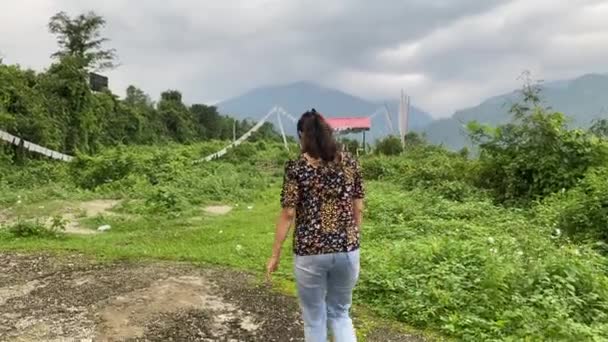 Rear View Happy Young Indian Girl Walking Mountain Roads Visiting — Stock video